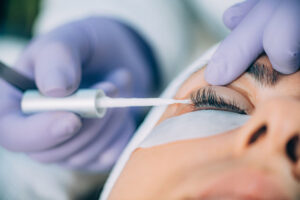 A detailed close-up of a professional lash extension Gloucester application on a client.