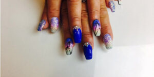 Professional technician performing a precision manicure at a nail salon Gloucester.